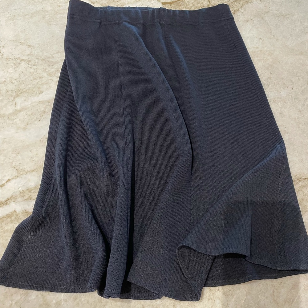Black St  John  Mid skirt. Hits Below knee